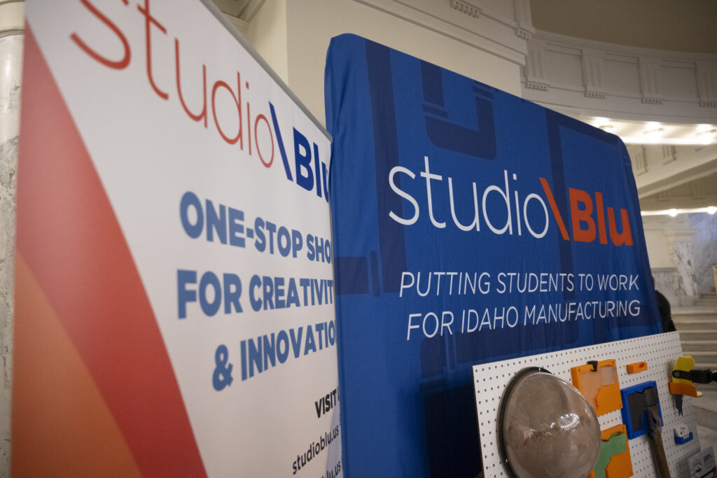 The studio\Blu booth banners at Bronco Day at the Capital