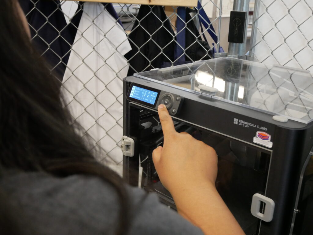 New Product Development Lab Employee Working the Bambu Printer